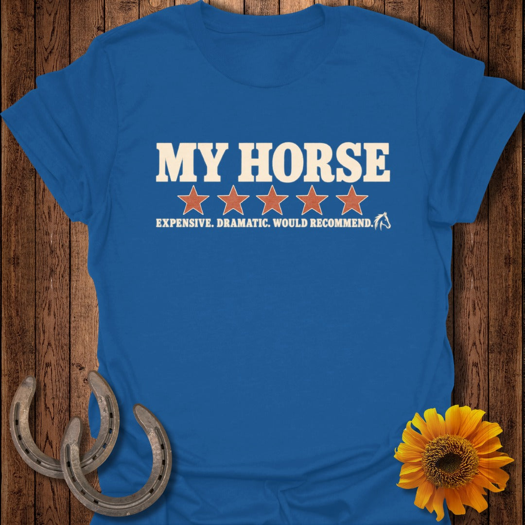 A blue T-shirt featuring white text that reads "MY HORSE" above five red stars and the subtitle "EXPENSIVE. DRAMATIC. WOULD RECOMMEND."