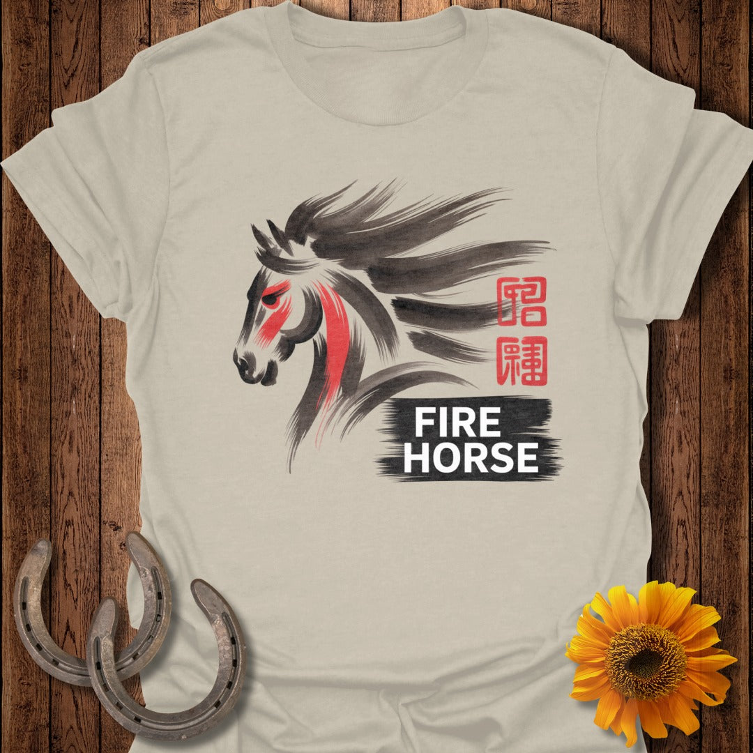 Light tan t-shirt with black and red abstract fire horse graphic and text.