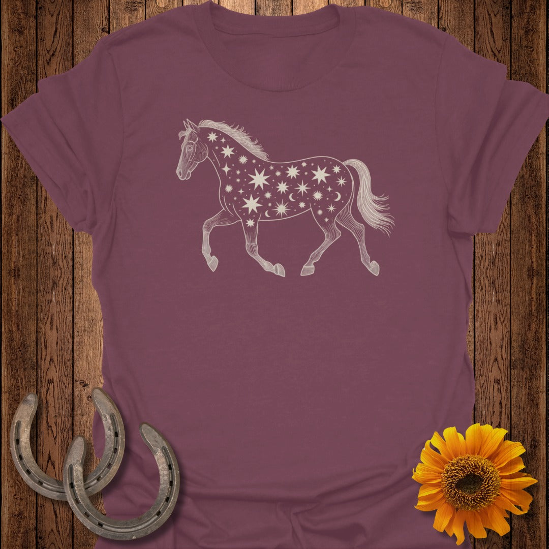 Maroon t-shirt with a celestial horse graphic, featuring stars and moons.
