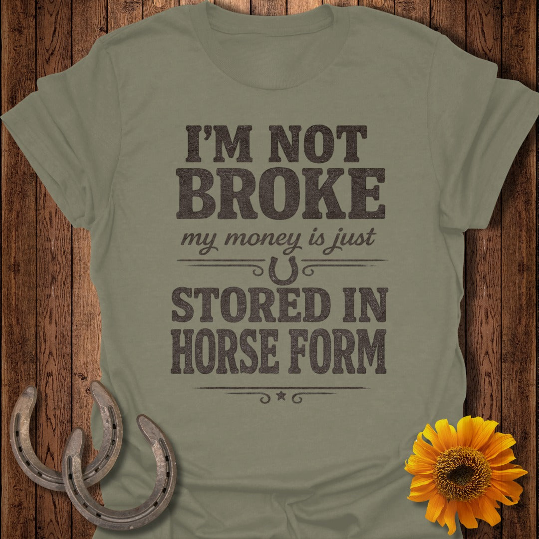 Olive green t-shirt with text "I'm not broke my money is just stored in horse form."