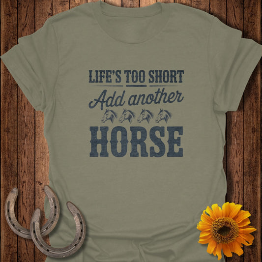 Olive green t-shirt with text "Life's Too Short Add Another HORSE" and horseshoes.
