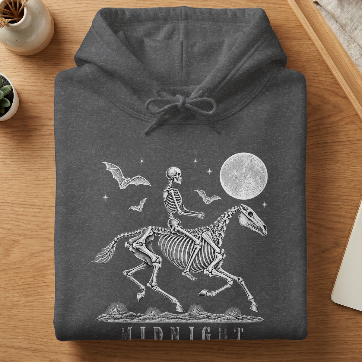 Skeleton rider on a skeleton horse under a full moon with bats and stars.