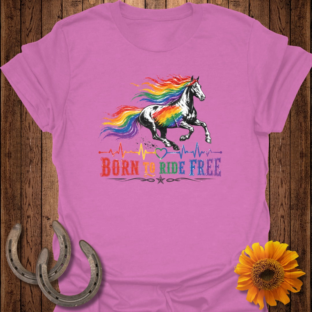 Pink t-shirt with a rainbow mane horse and "Born to Ride Free" text.
