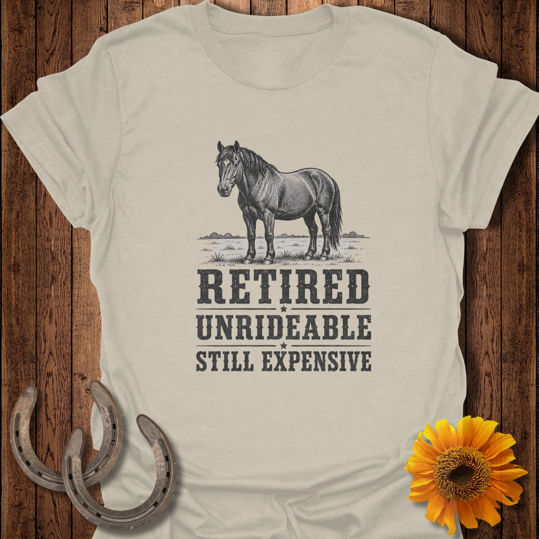 T-shirt with horse graphic and text "RETIRED UNRIDEABLE STILL EXPENSIVE".