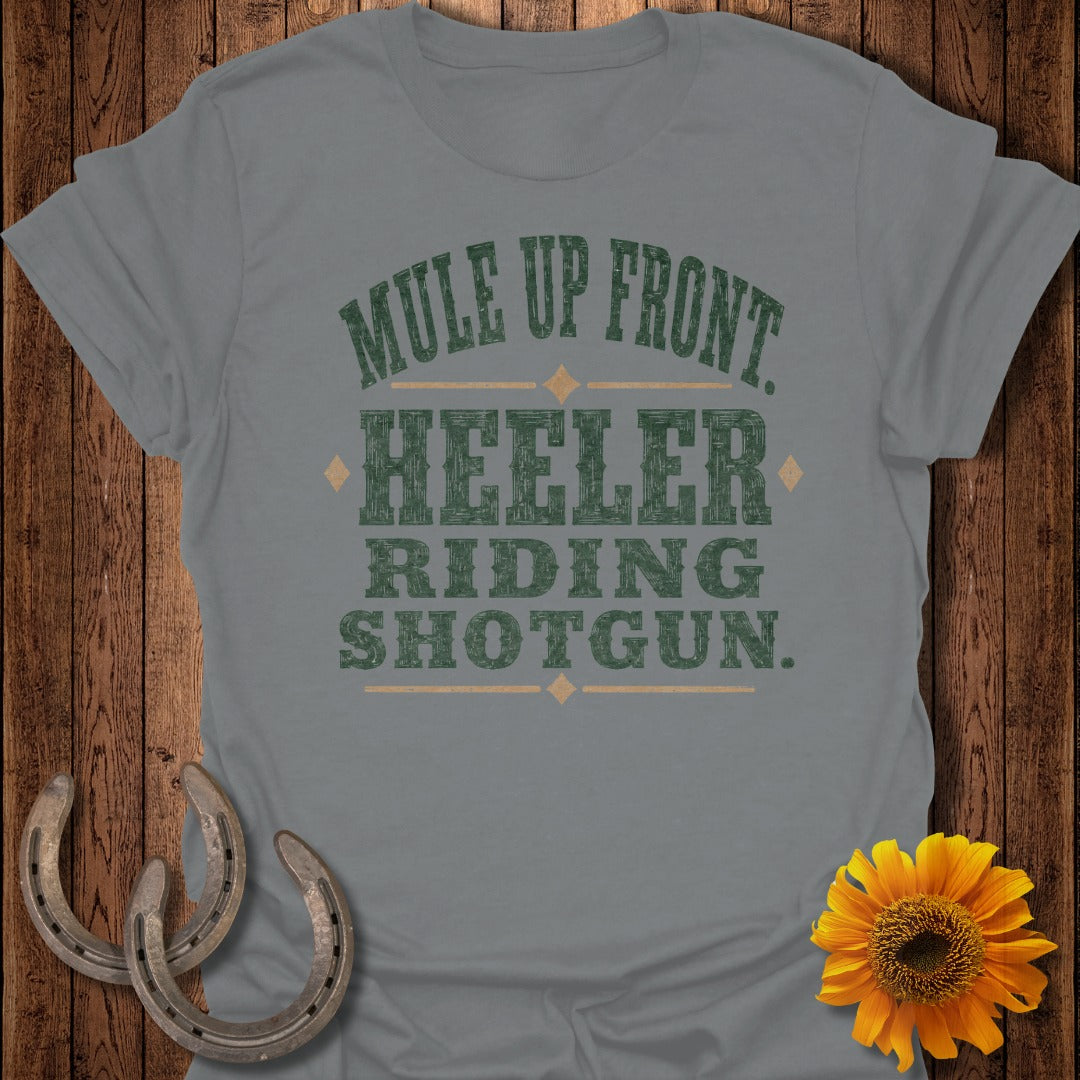 T-shirt with green text "Mule up Front, Heeler Riding Shotgun" and horseshoes.
