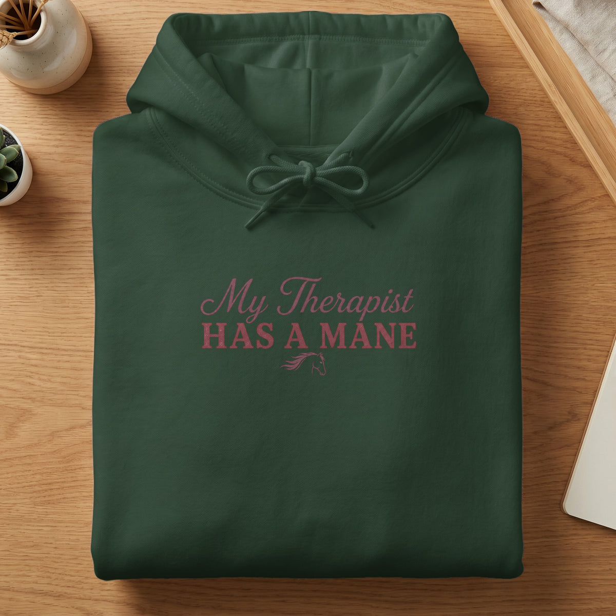 Dark green hoodie with "My Therapist HAS A MANE" and horse graphic.
