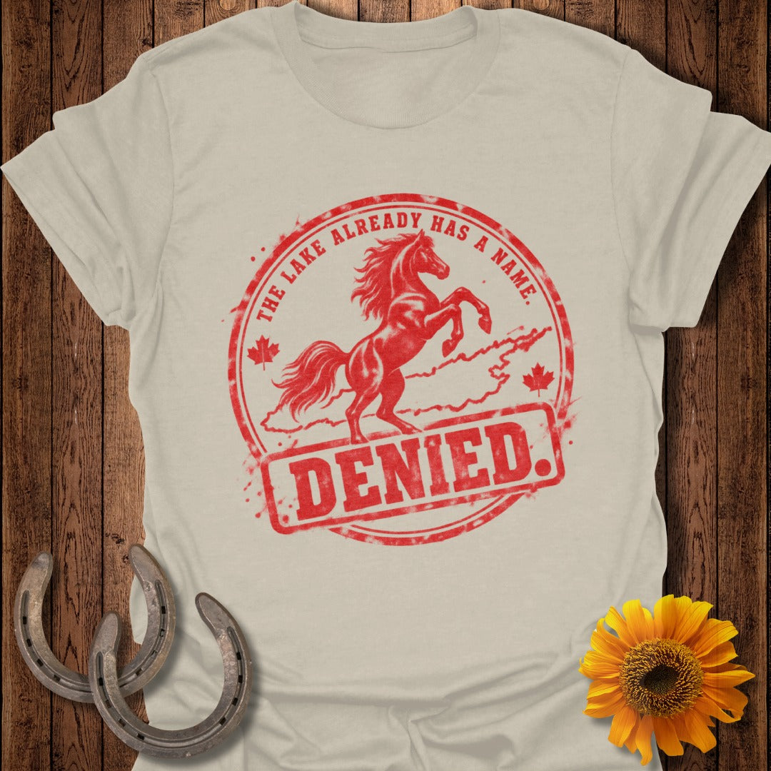 T-shirt with red distressed graphic of rearing horse, "DENIED," and text "THE LAKE ALREADY HAS A NAME."