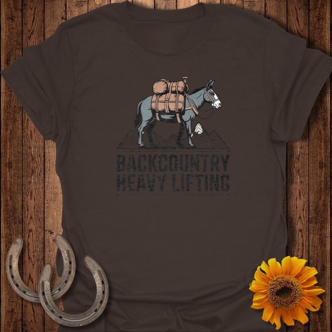 Brown t-shirt with text "BACKCOUNTRY HEAVY LIFTING" and a mule carrying gear.