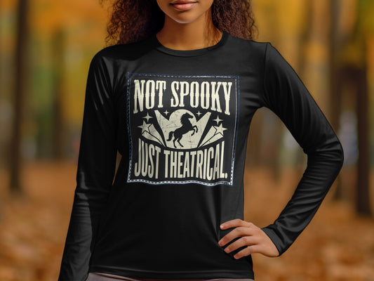 Black long sleeve shirt with "Not Spooky Just Theatrical" and a horse design.