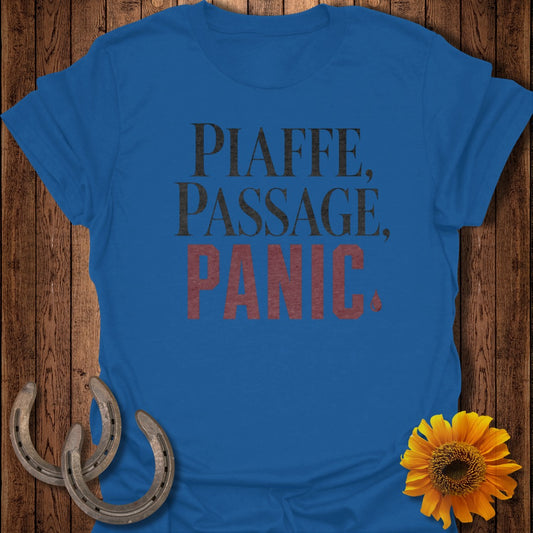 Blue t-shirt with "Piaffe, Passage, Panic" text, two horseshoes, and a sunflower.