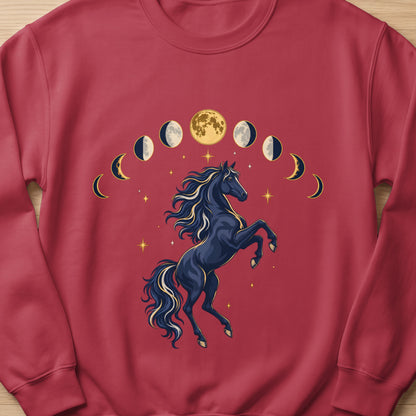 Dark horse rearing with a moon phase cycle above on a crimson sweatshirt.