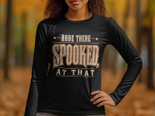 Black long-sleeve shirt with text "RODE THERE SPOOKED AT THAT."