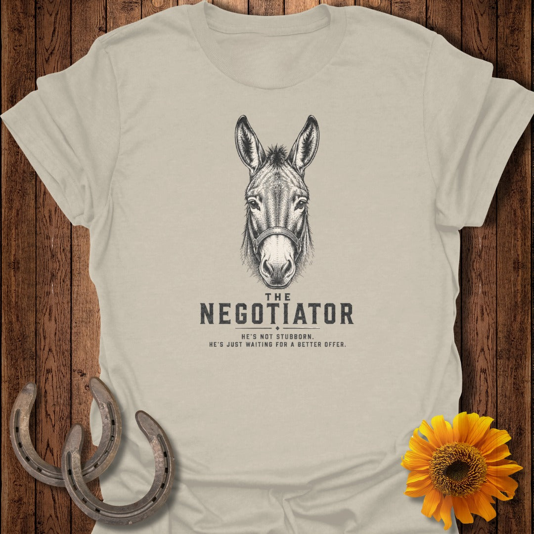 Cream t-shirt with "The Negotiator" text and donkey illustration.