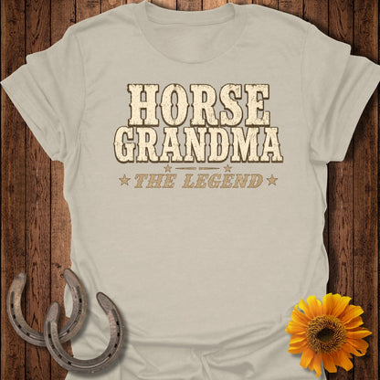 Light beige t-shirt with "HORSE GRANDMA THE LEGEND" text and horse shoes.