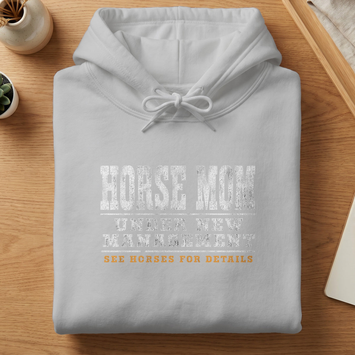 White hoodie with "Horse Mom Under New Management See Horses For Details" graphic.