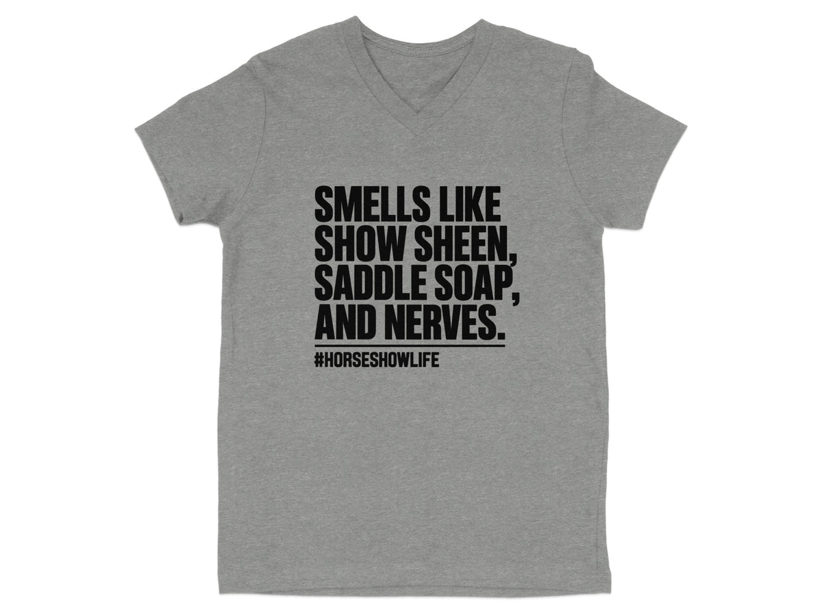 Grey t-shirt with black text: Smells like show sheen, saddle soap, and nerves. #horseshowlife