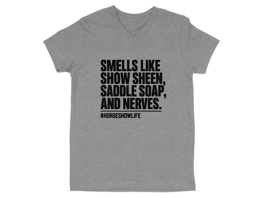 Grey t-shirt with black text: Smells like show sheen, saddle soap, and nerves. #horseshowlife