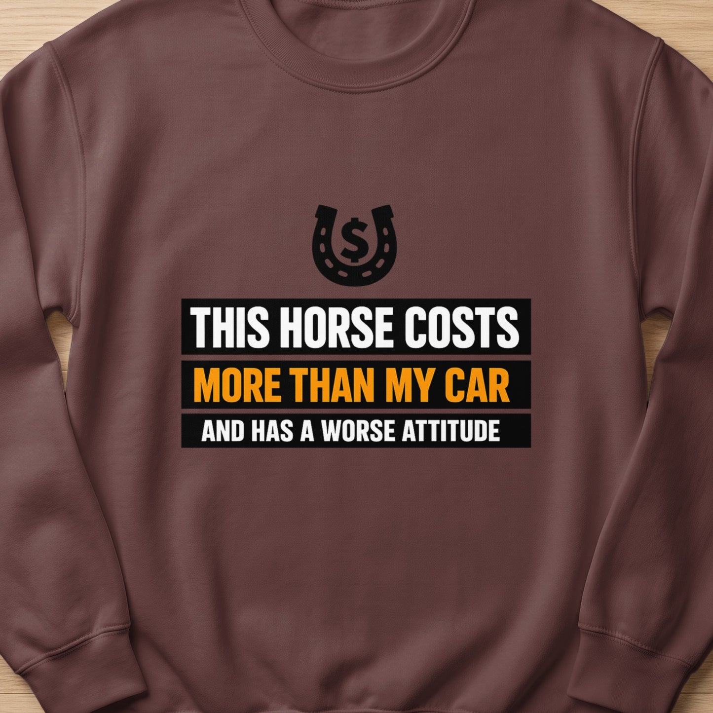 Brown sweatshirt with text "This horse costs more than my car and has a worse attitude".