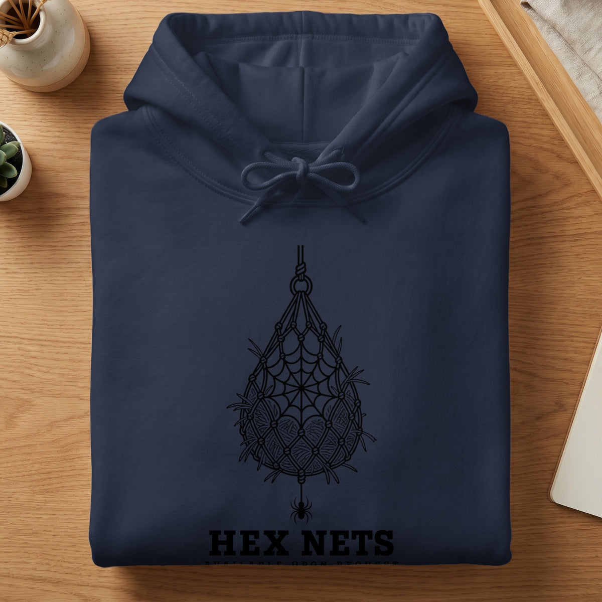 Dark navy hoodie with a black spiderweb and "HEX NETS" text graphic.