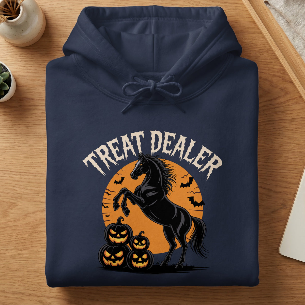 Navy hoodie with "Treat Dealer" text and black horse with pumpkins.