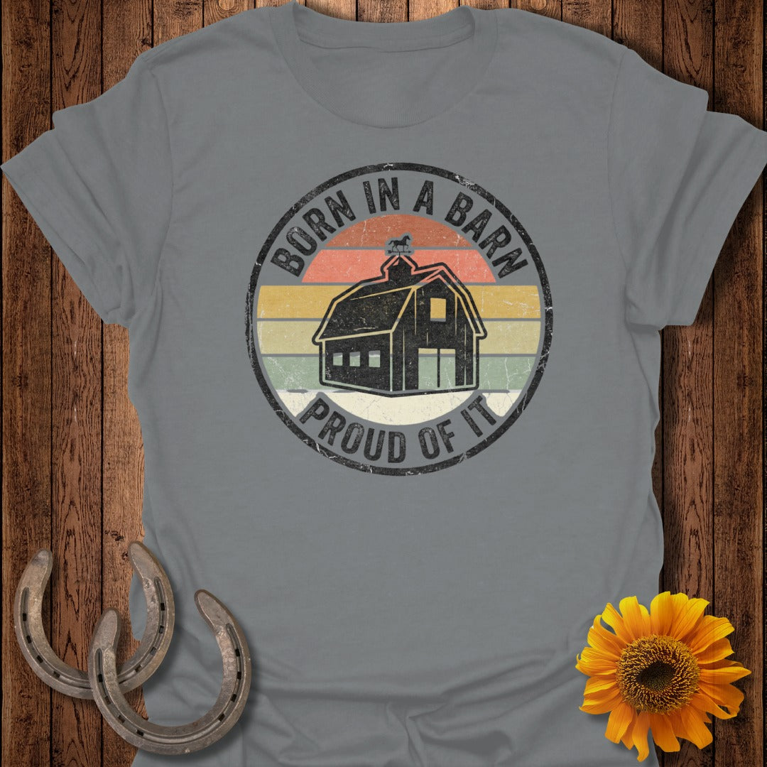 Gray t-shirt with "Born in a Barn Proud of It" text and barn graphic.