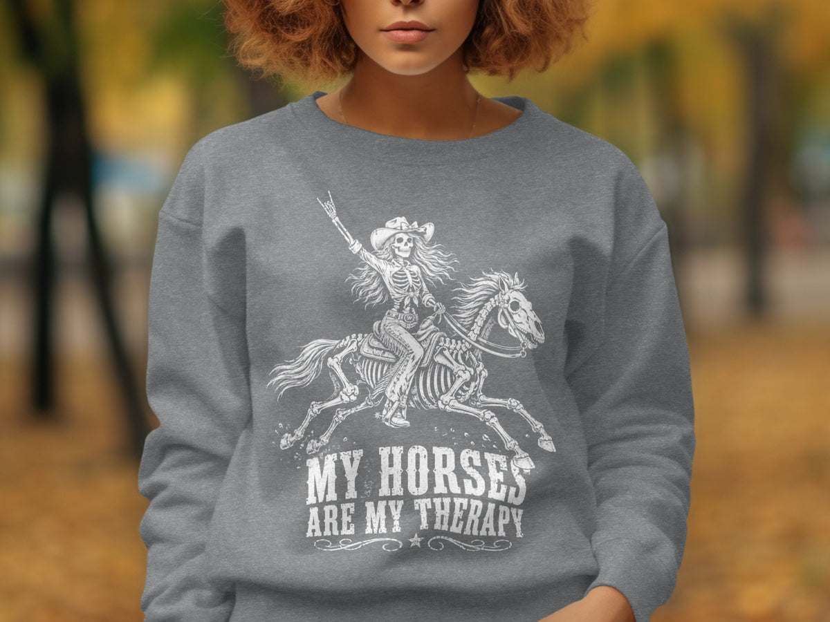 Skeleton riding a horse, with text "MY HORSES ARE MY THERAPY".