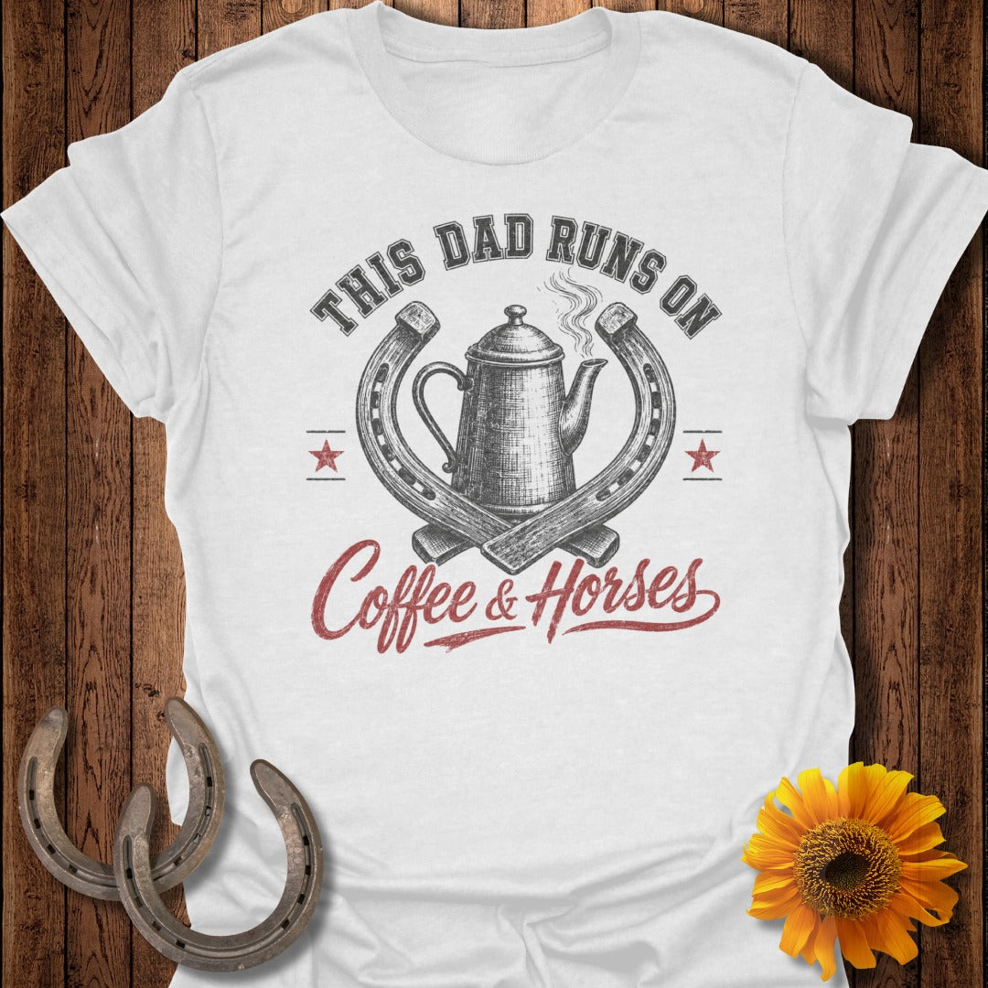 White t-shirt with "THIS DAD RUNS ON COFFEE & HORSES" text and horseshoe graphic.