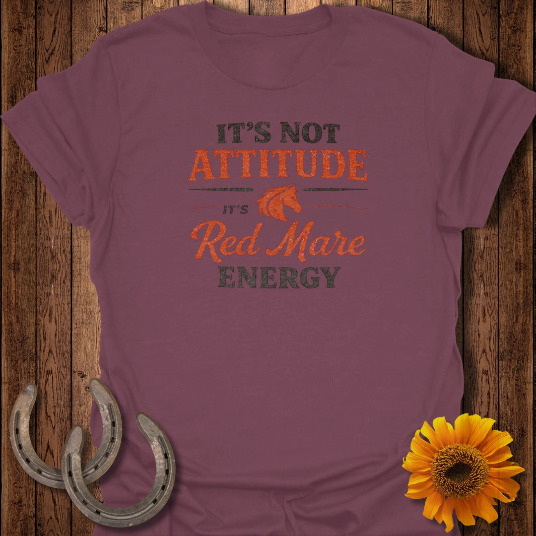 Burgundy t-shirt with "It's Not Attitude, It's Red Mare Energy" text.