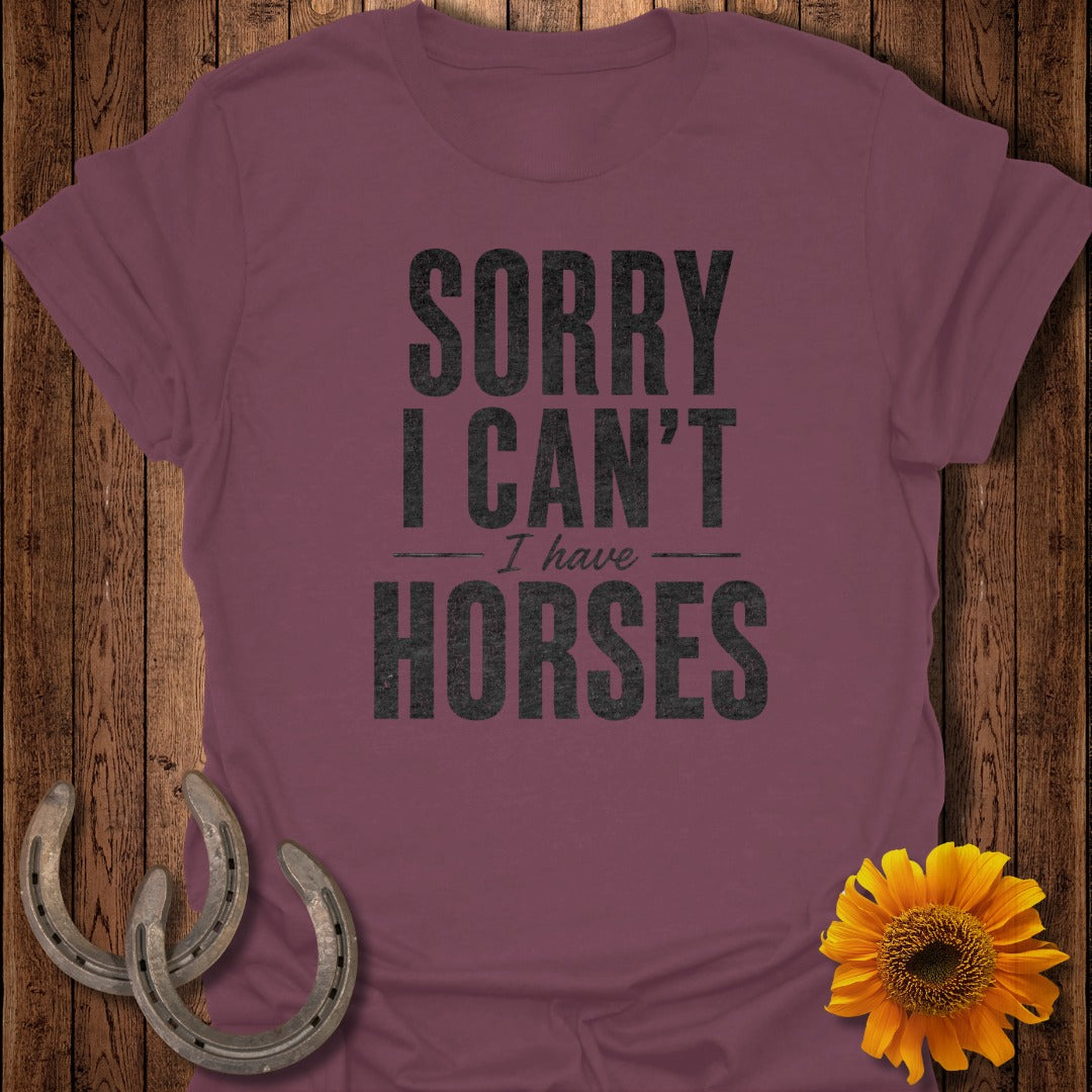 Burgundy t-shirt with "Sorry I Can't I Have Horses" text, featuring horseshoes and sunflower.