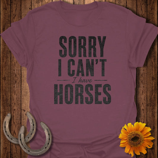 Burgundy t-shirt with "Sorry I Can't I Have Horses" text, featuring horseshoes and sunflower.