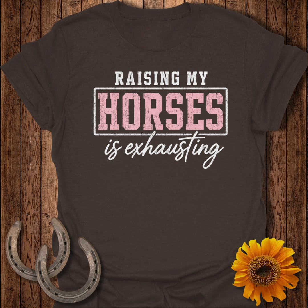 Brown t-shirt with "Raising my horses is exhausting" text, horseshoes and sunflower.