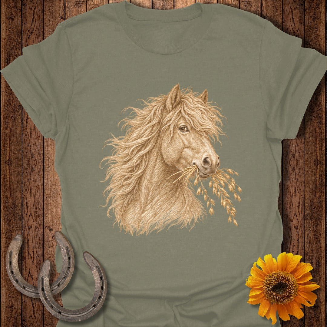 T-shirt with a drawing of a horse eating oats, horseshoes, and a sunflower.