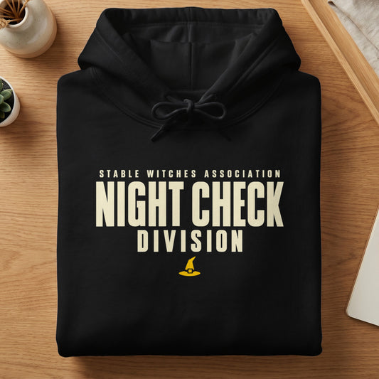 Black hoodie with "STABLE WITCHES ASSOCIATION NIGHT CHECK DIVISION" text and witch hat graphic.