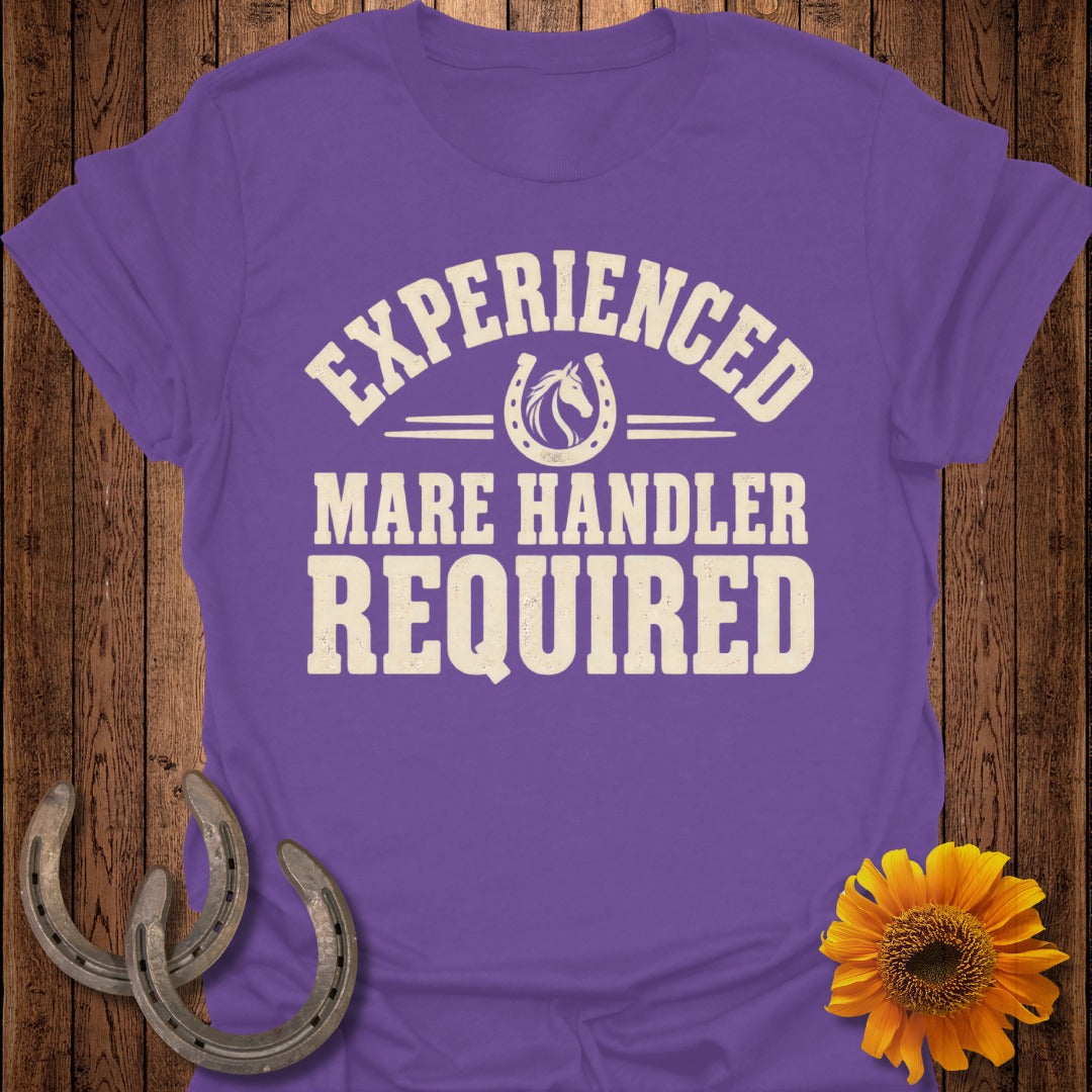 Purple t-shirt with "Experienced Mare Handler Required" text and horseshoe graphic.