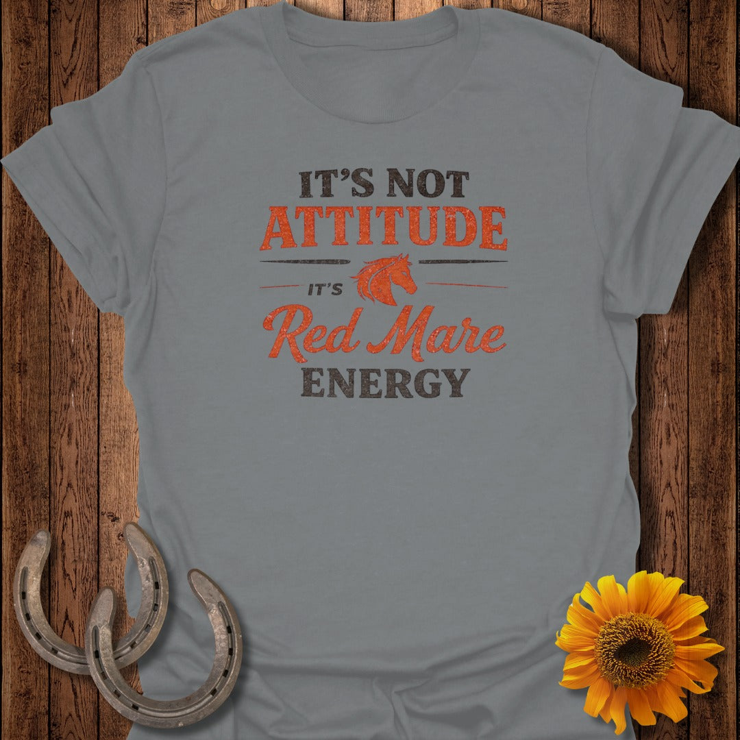 Grey t-shirt with orange text: "It's not attitude, it's Red Mare energy."
