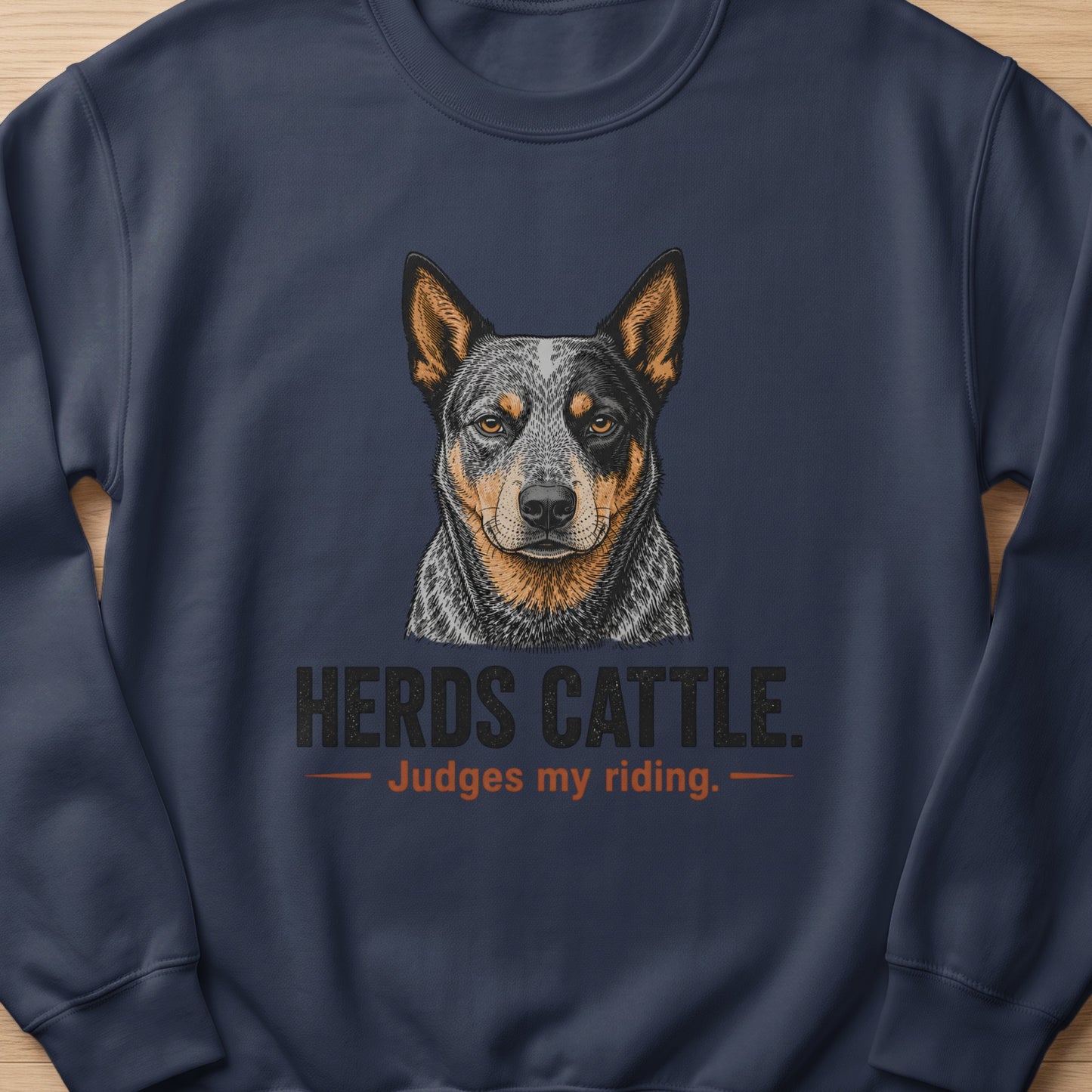 Dark blue sweatshirt with an Australian Cattle Dog portrait and text.