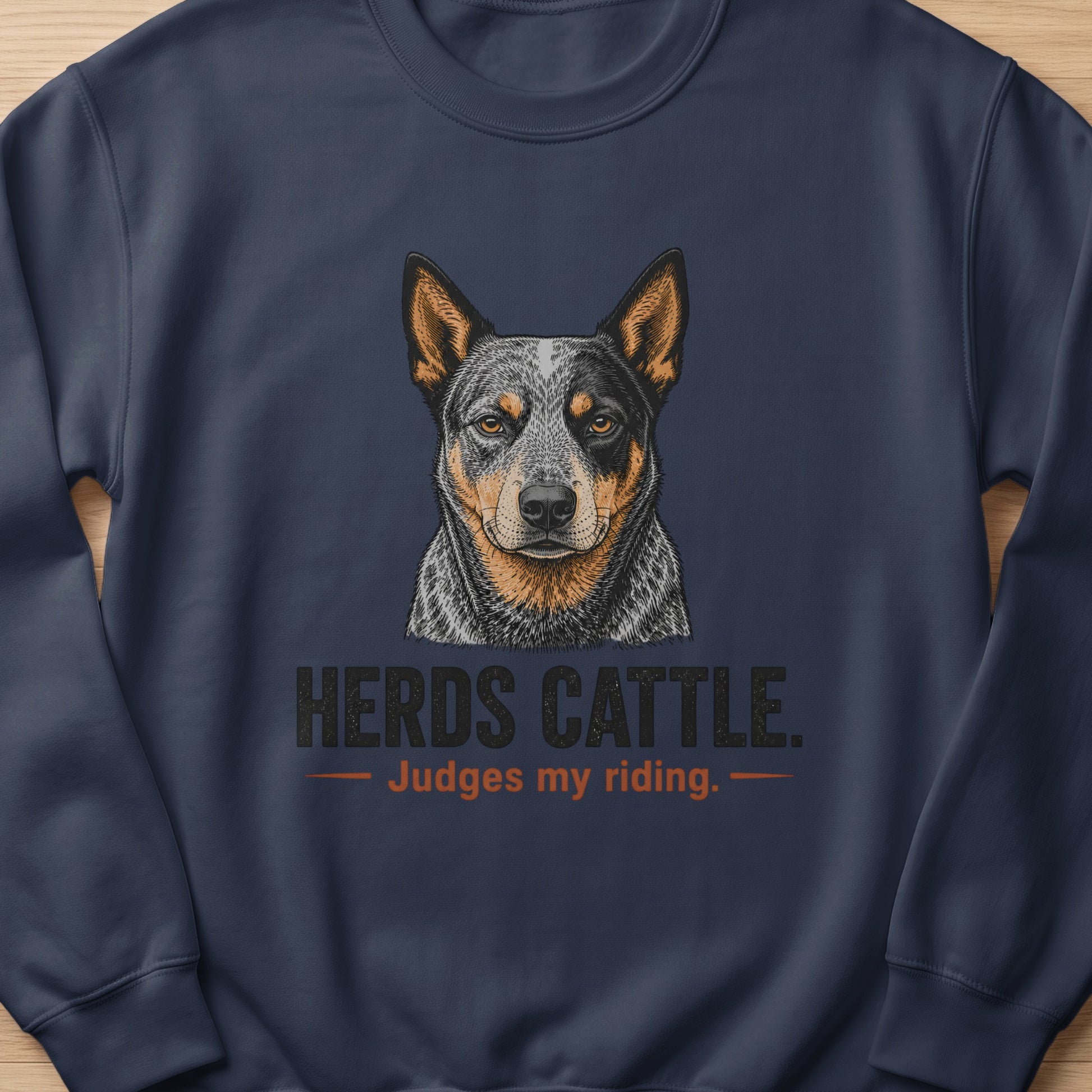 Dark blue sweatshirt with an Australian Cattle Dog portrait and text.