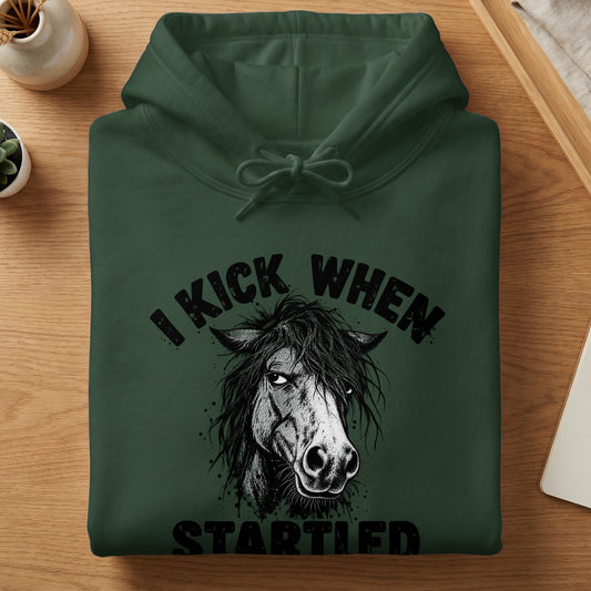 Dark green hoodie with a black graphic of a horse's face and text "I KICK WHEN STARTLED".