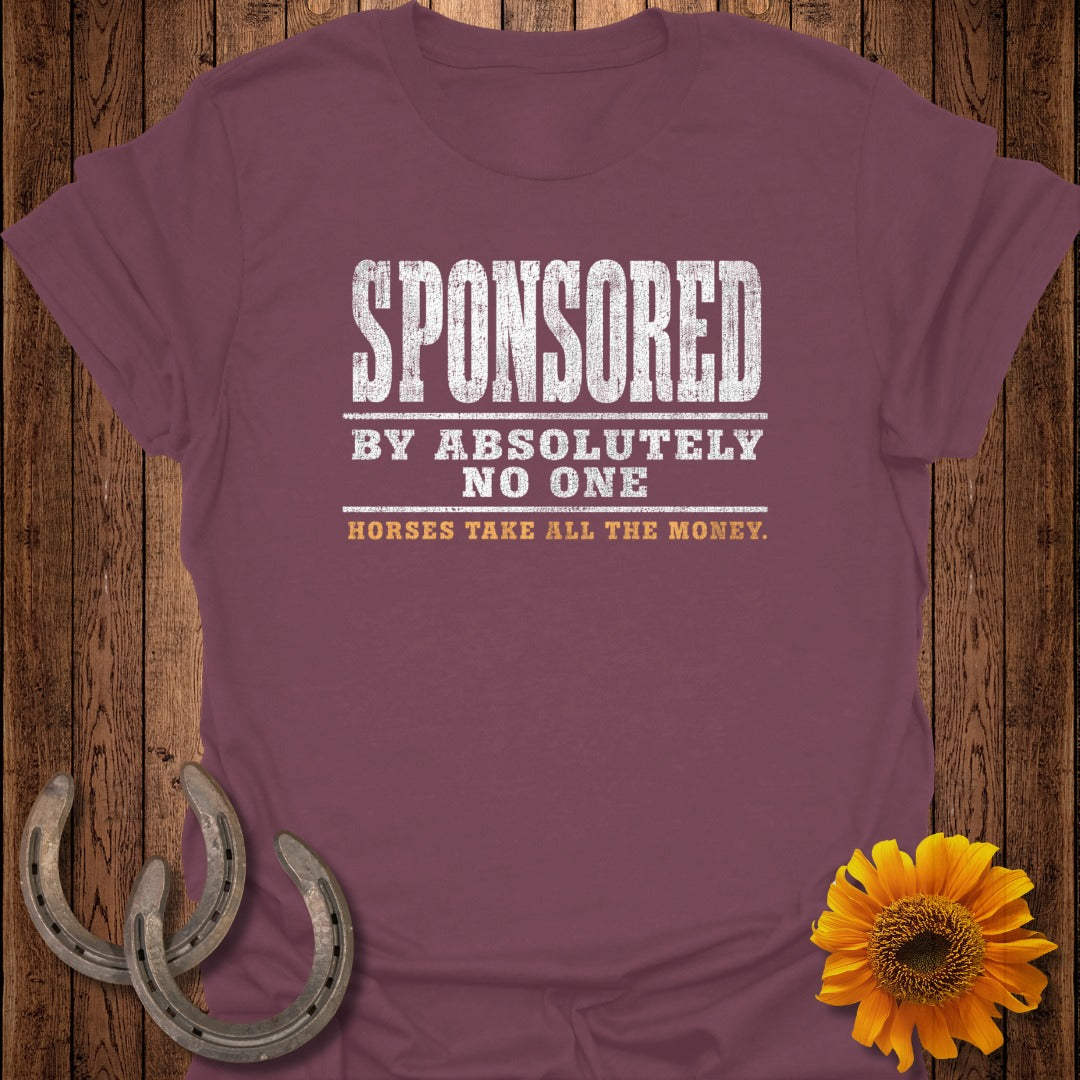 Maroon t-shirt with "Sponsored By Absolutely No One. Horses Take All The Money." text.