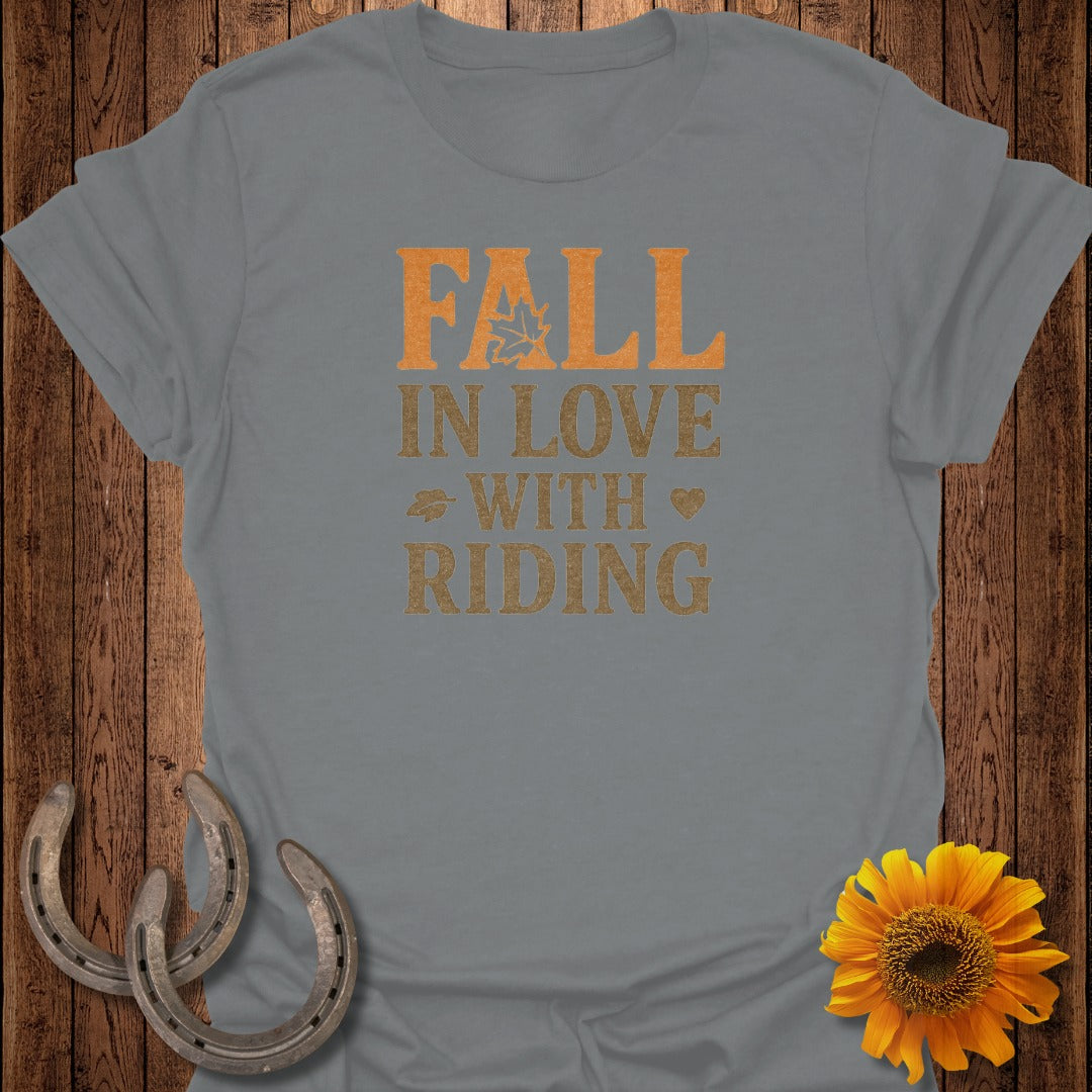 Gray t-shirt with "FALL IN LOVE WITH RIDING" text and autumn leaf graphic.