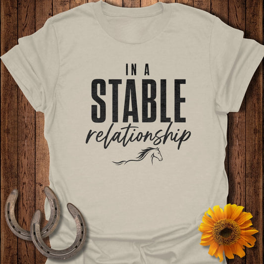 Light beige t-shirt with "In A Stable Relationship" text and a horse graphic.