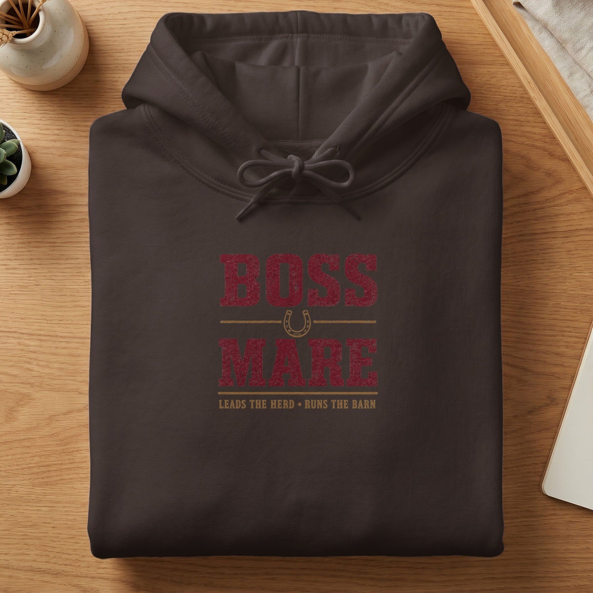 Brown hoodie with distressed red text "BOSS MARE" and "LEADS THE HERD RUNS THE BARN".