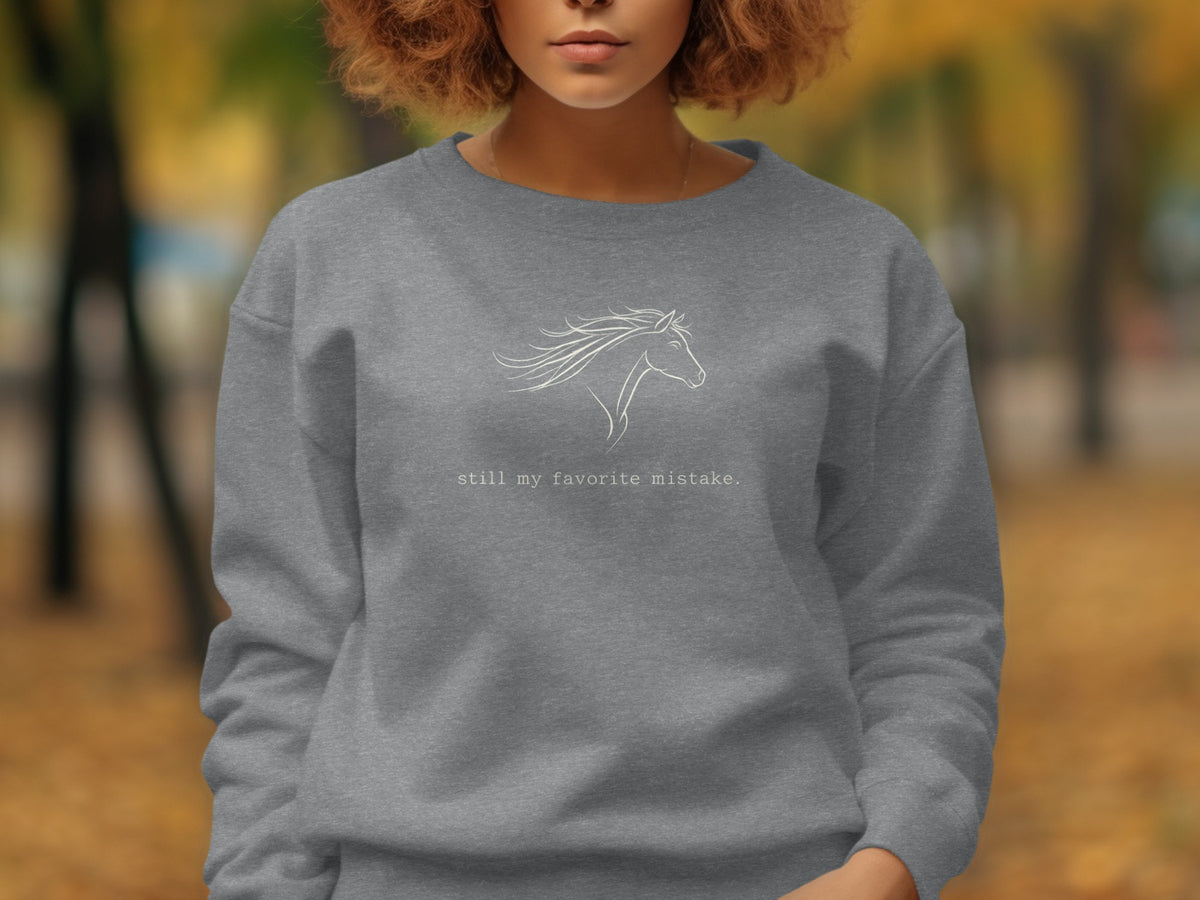 Grey sweatshirt with a white line drawing of a horse and text.