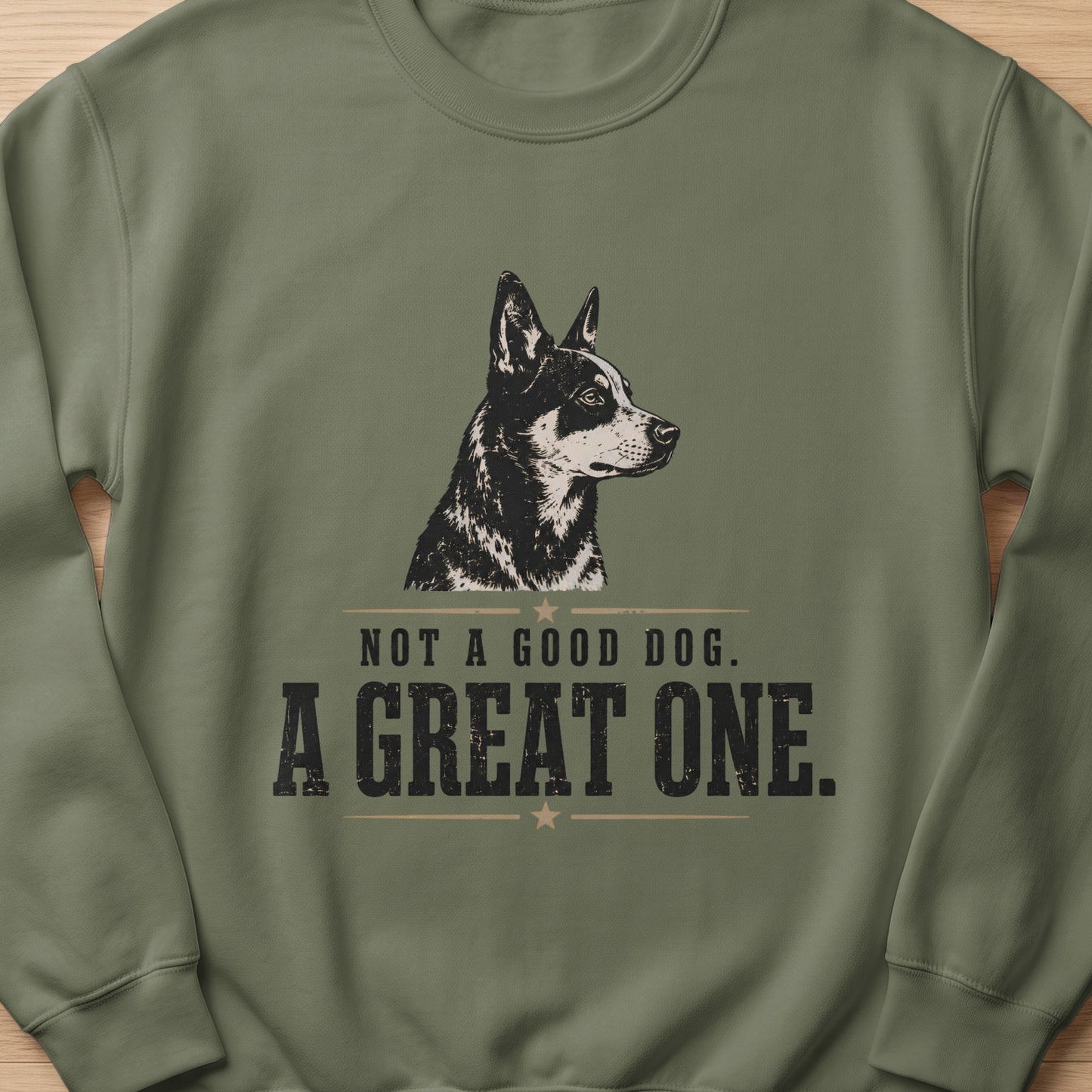 Green sweatshirt with dog illustration and text "NOT A GOOD DOG. A GREAT ONE."
