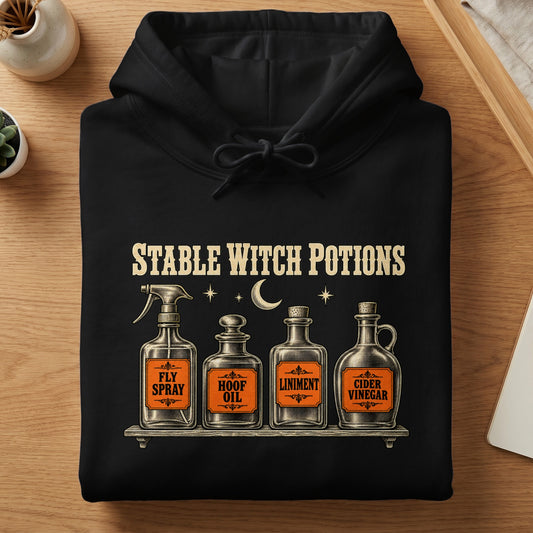 Black hoodie with "STABLE WITCH POTIONS" text and four potion bottles.