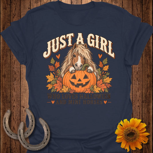 Navy t-shirt with "Just a girl who loves Halloween and mini horses" text and horse illustration.
