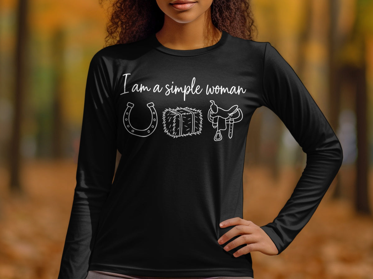 Black long sleeve shirt with white text and graphics of horseshoe, hay bale, and saddle.