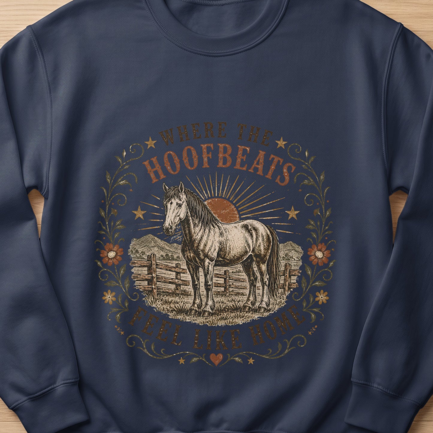 Navy sweatshirt featuring a vintage horse graphic with text "Where the Hoofbeats Feel Like Home".