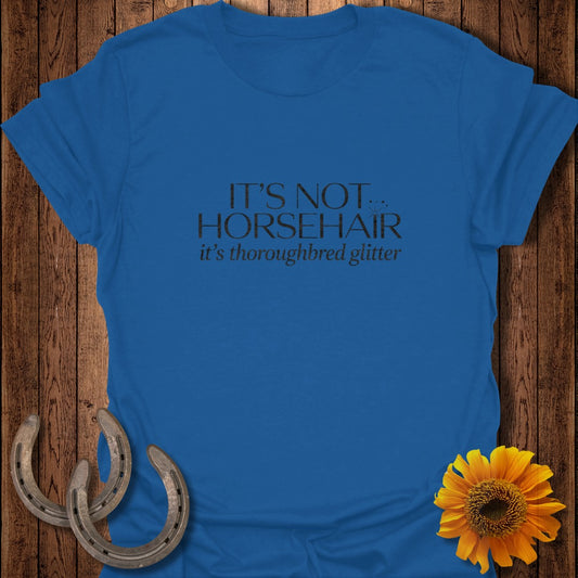 Royal blue t-shirt with "IT'S NOT thoroughbred glitter" text.