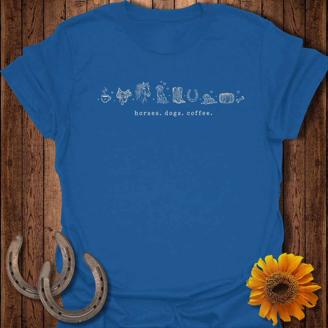 Blue t-shirt with line art of horses, dogs, and coffee cup icons.